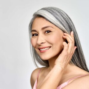 woman smiling at camera.