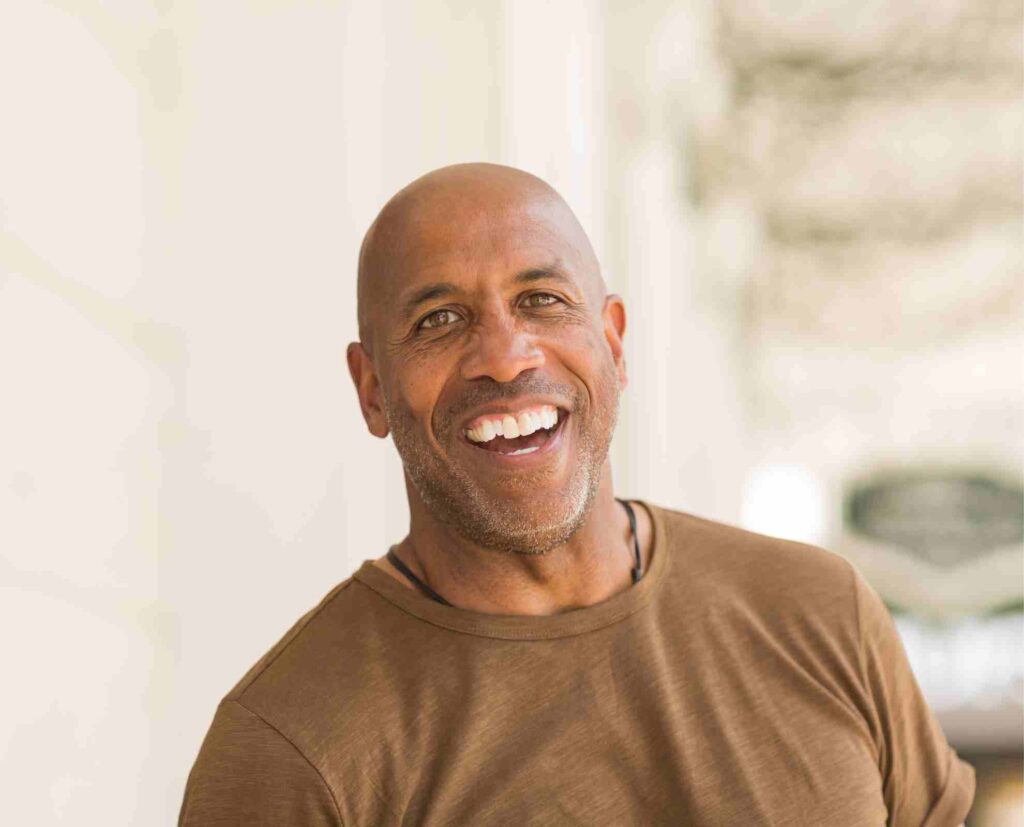 man smiling at camera.