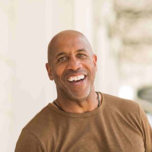 man smiling at camera.