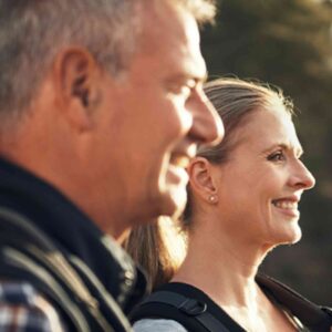 Man And Woman Outside Being Active.