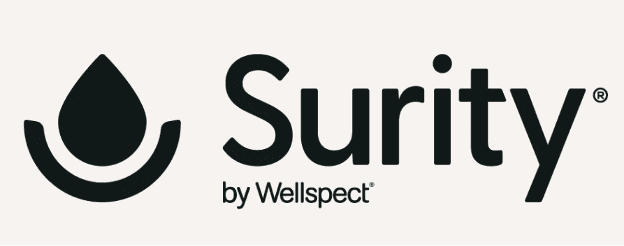 The image shows the Surity by Wellspect logo, featuring a black water droplet above a curved line, followed by the word Surity in bold and by Wellspect below in smaller text. Featured Partner: Aeroflow Urology.