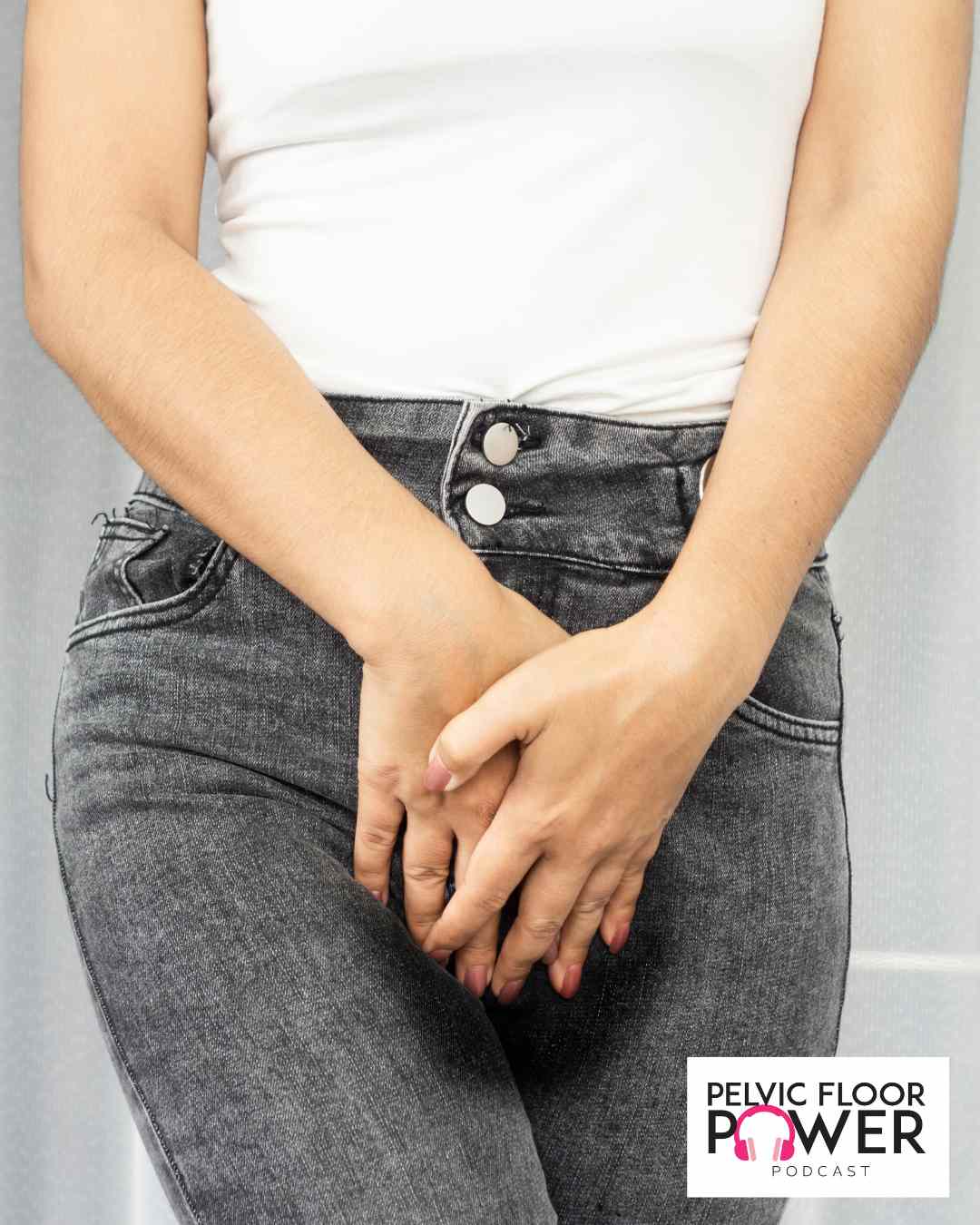 woman holding herself; needs to go to the bathroom.