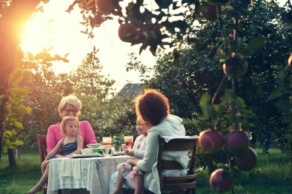 family sitting outside.