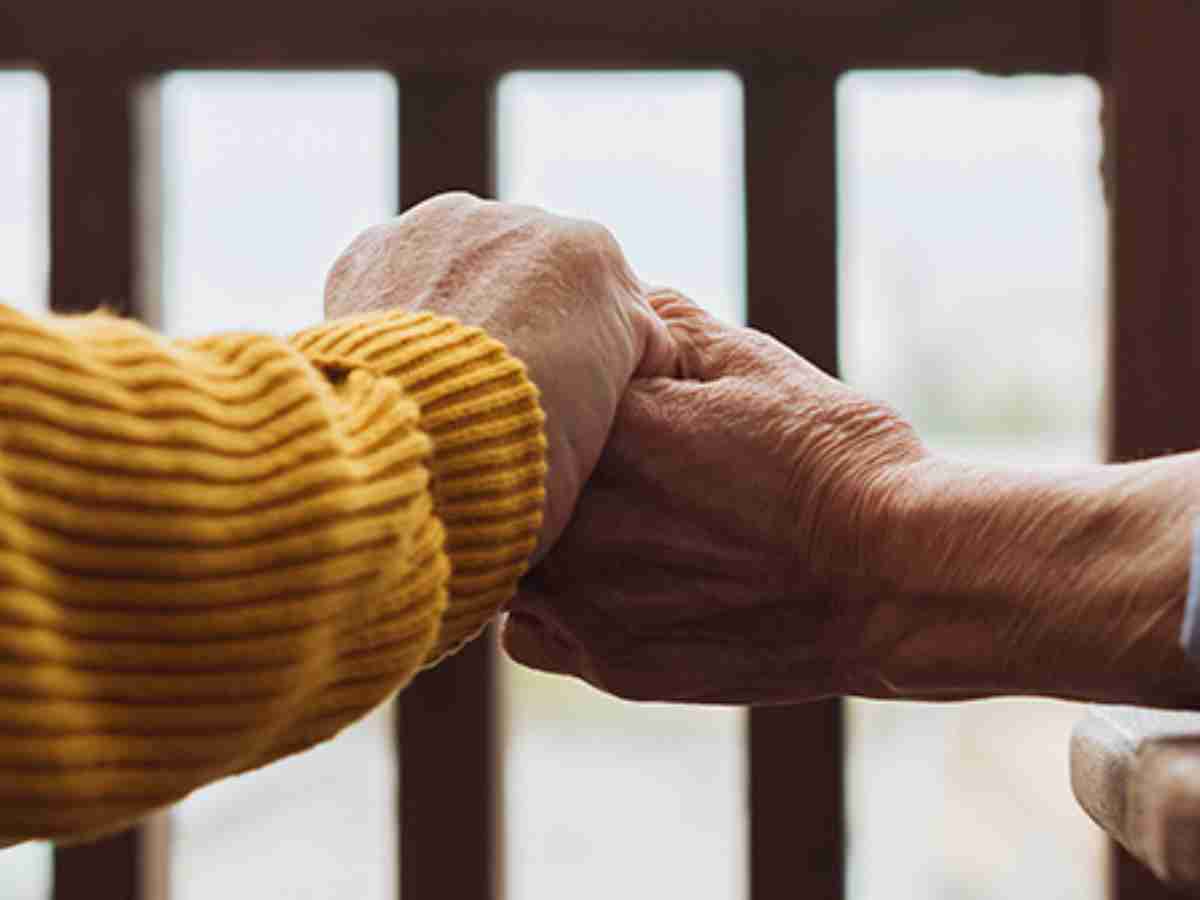 man and woman holding hands.